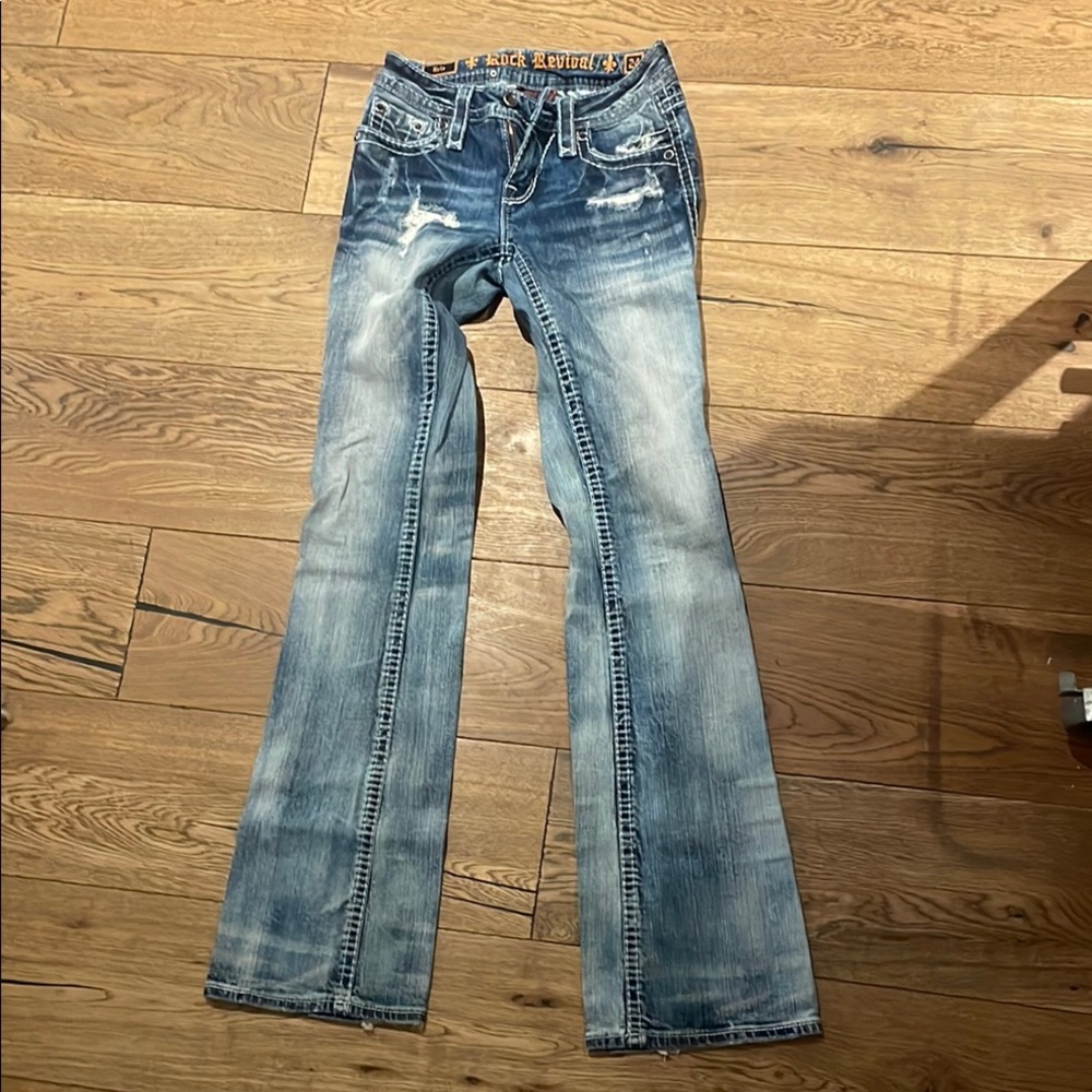 Rock Revival Blue Boot Cut Jeans with Vintage Distressing